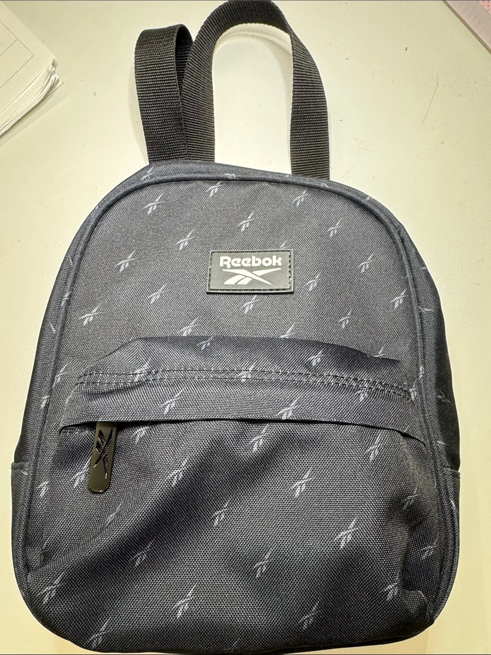 Reebok Black Mini Backpack with Subtle Logo Print. Excellent Condition